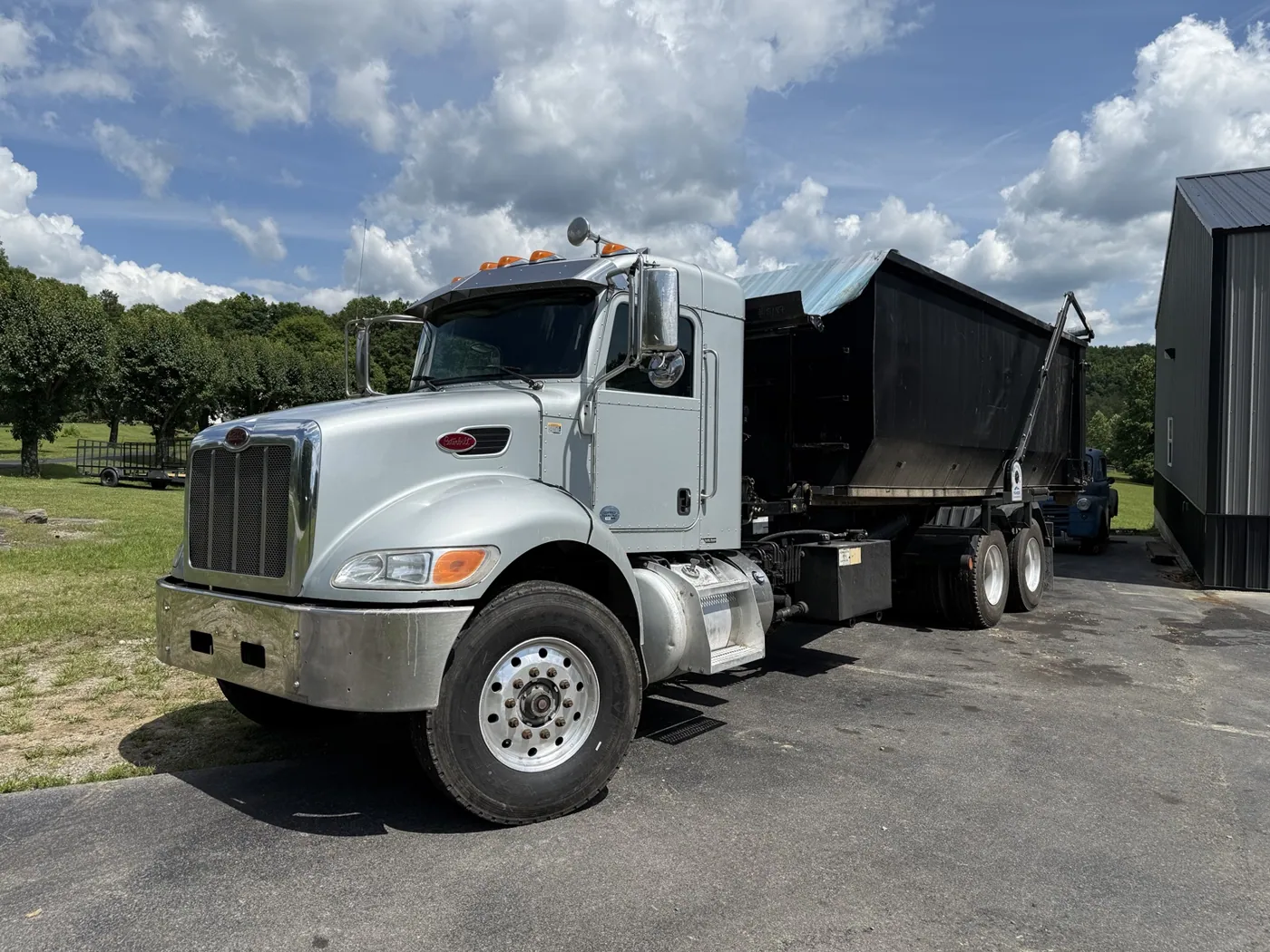 TriStar Dumpsters roll-off truck and container